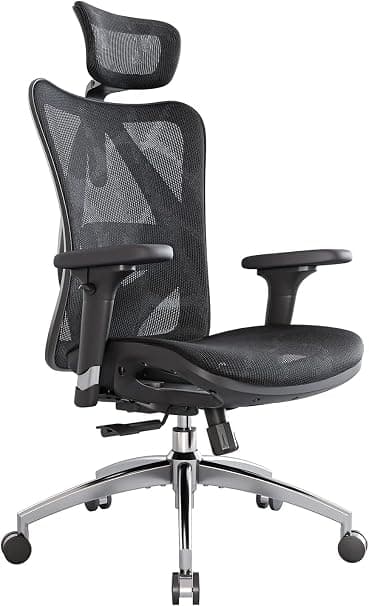 Home office desk setup with ergonomic chair and monitor